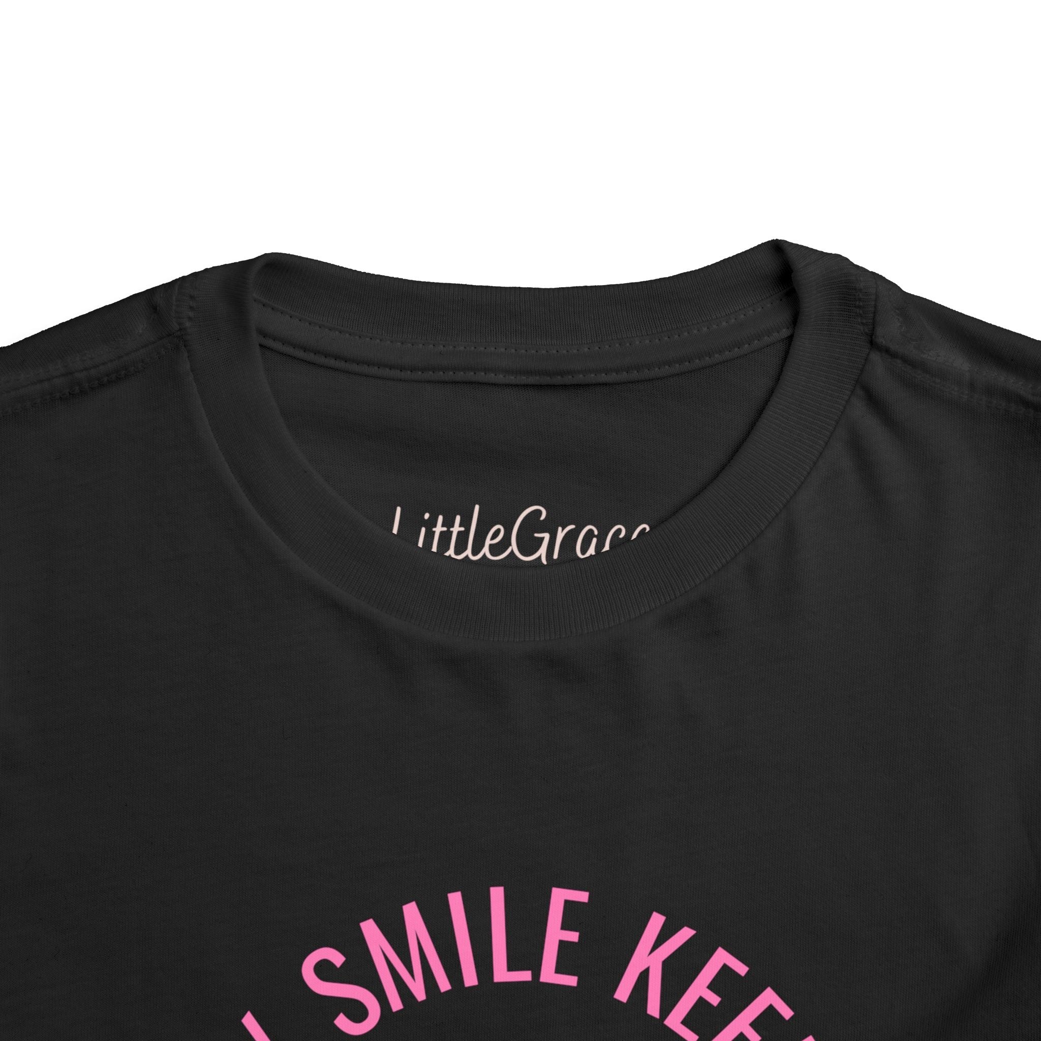 My Smile Keeps Me Out Of Trouble Toddler Tee