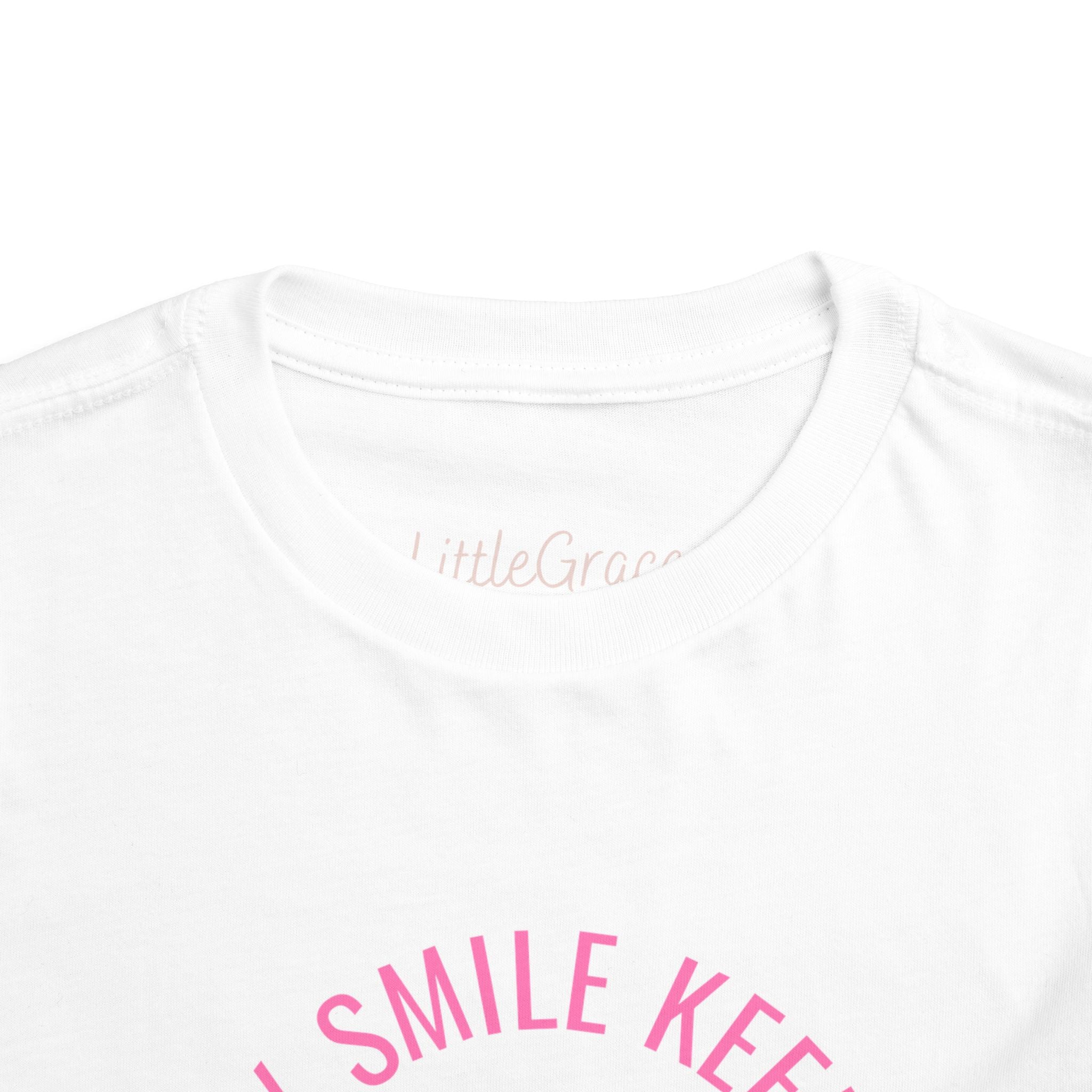 My Smile Keeps Me Out Of Trouble Toddler Tee