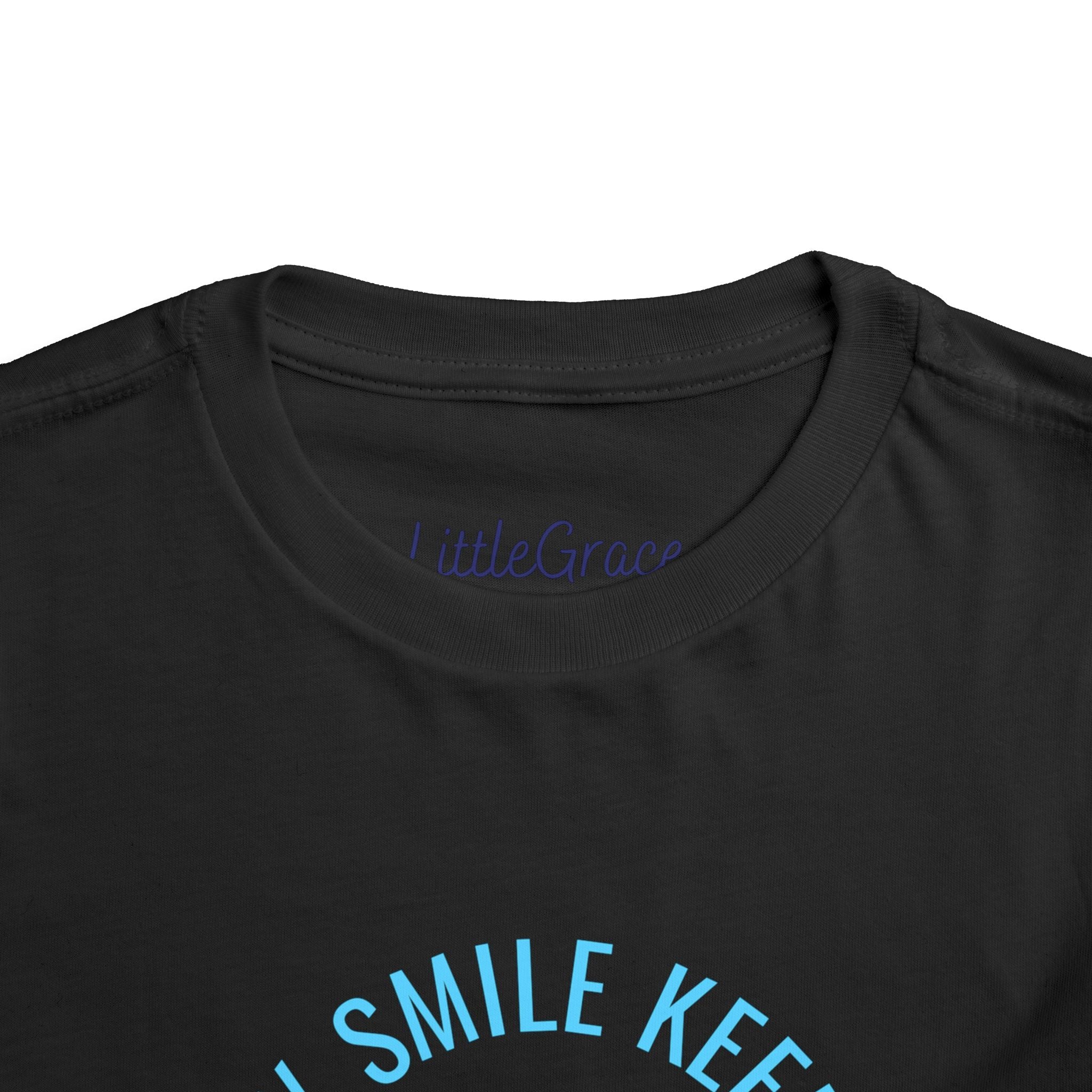 My Smile Keeps Me Out Of Trouble Toddler Tee